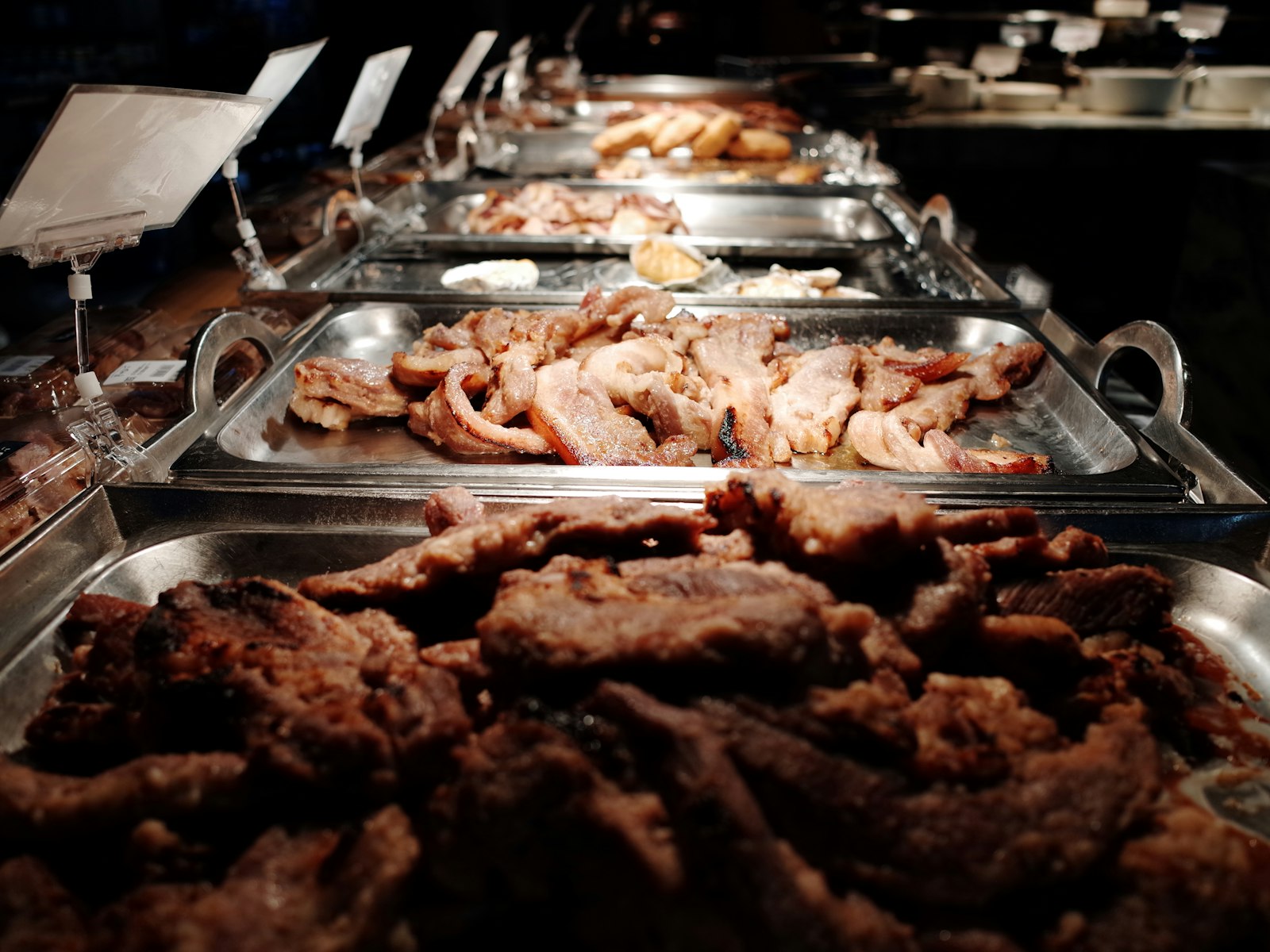Trays of catered food laid out buffet-style for an off-site event