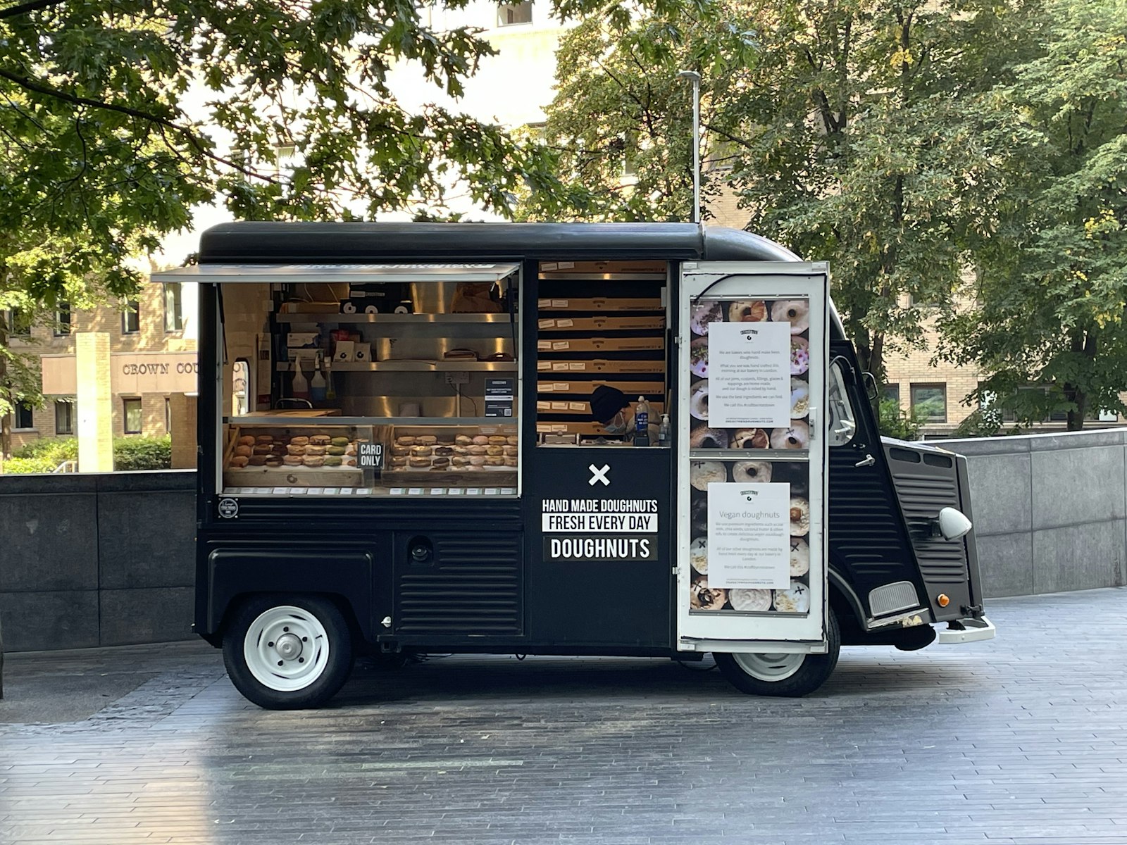 A food truck parked and ready to serve, representing the vehicle on the road every day